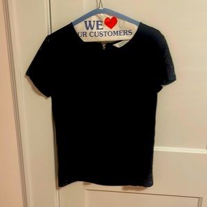 Beautiful yet fun black short sleeve blouse